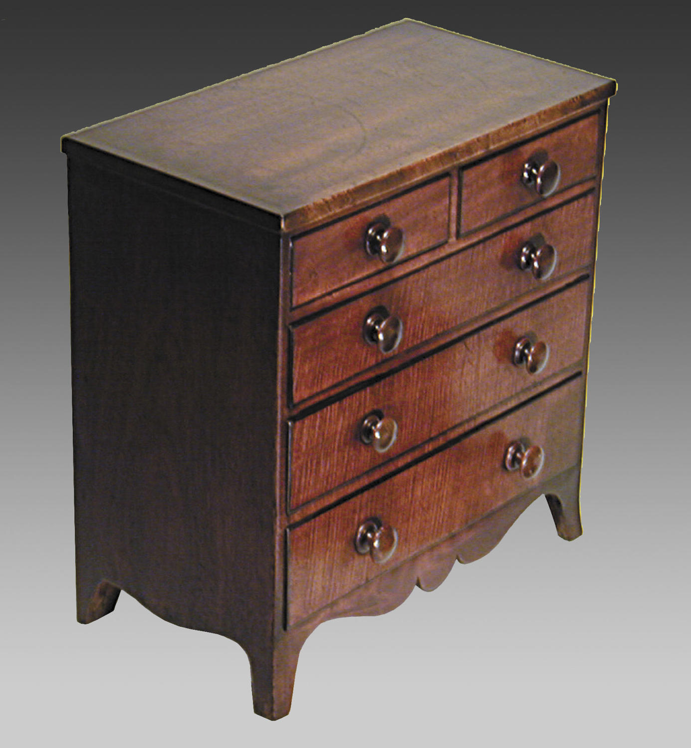 Antique miniature Sheraton mahogany chest of drawers