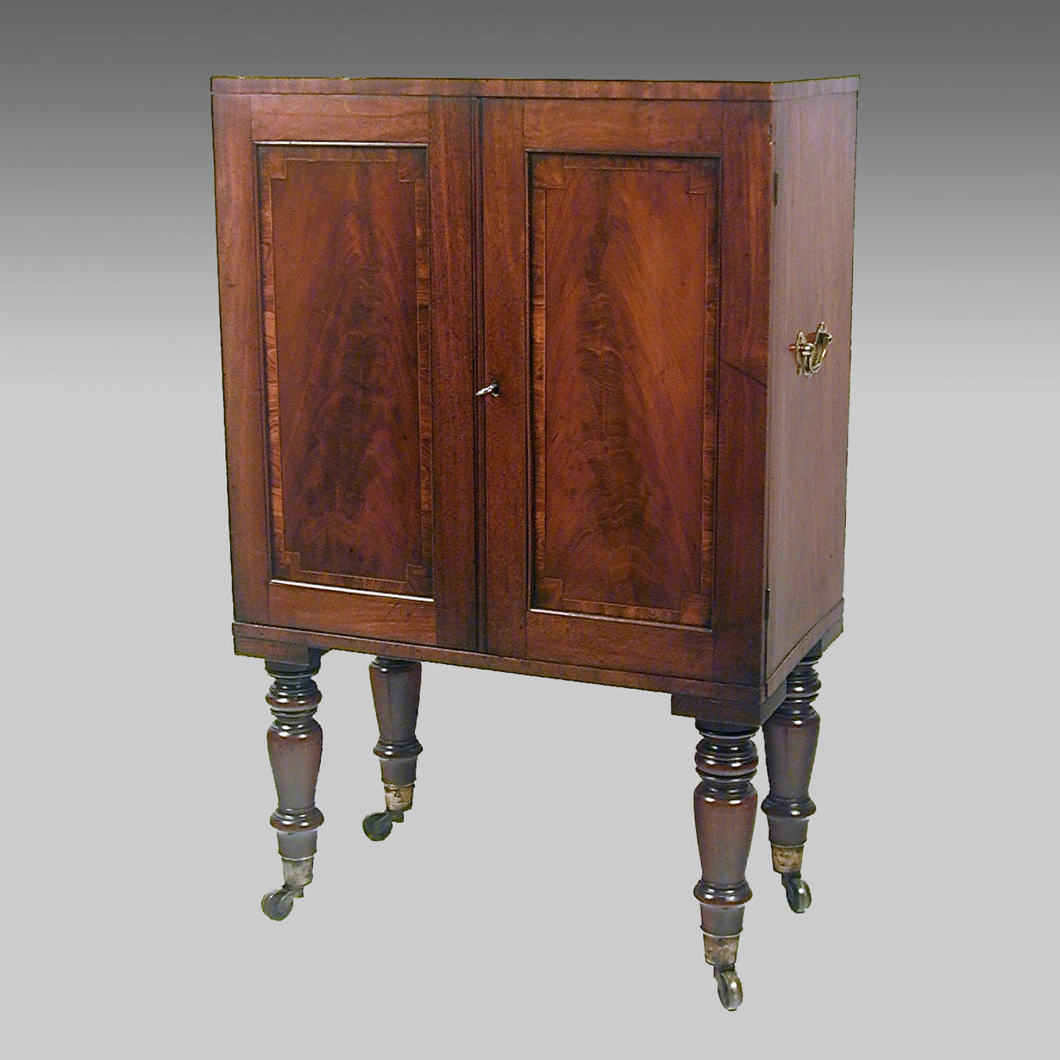 Small Sheraton mahogany collector's cabinet on stand