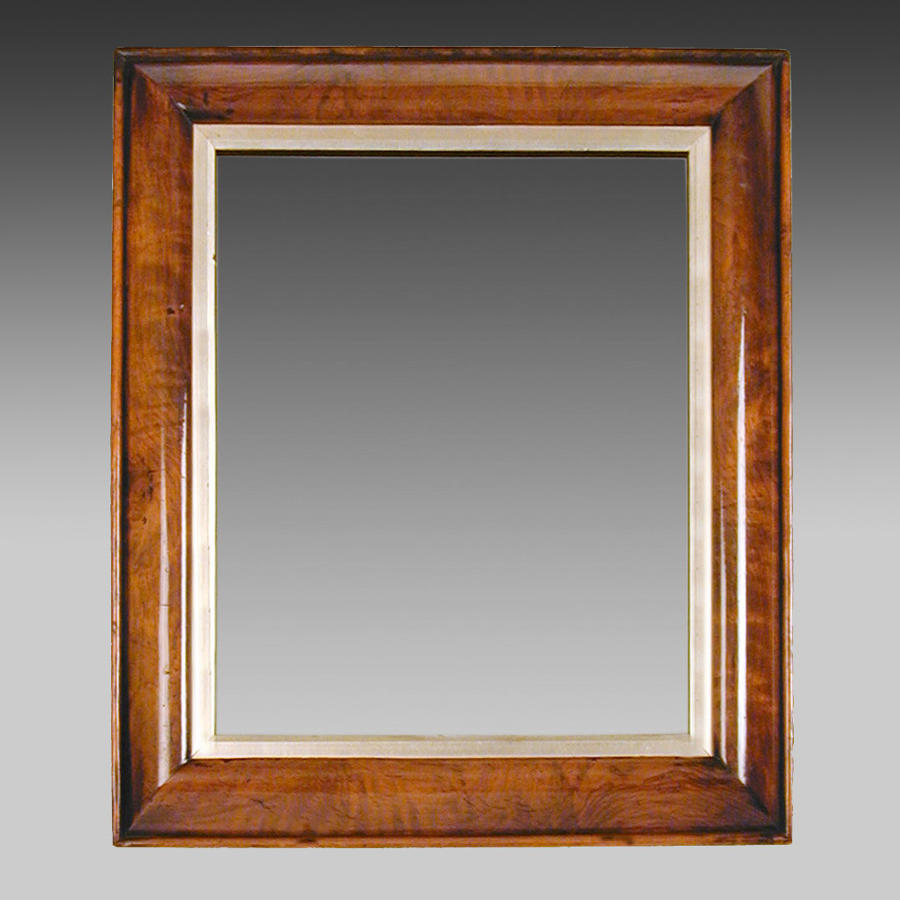 19th century walnut framed portrait mirror