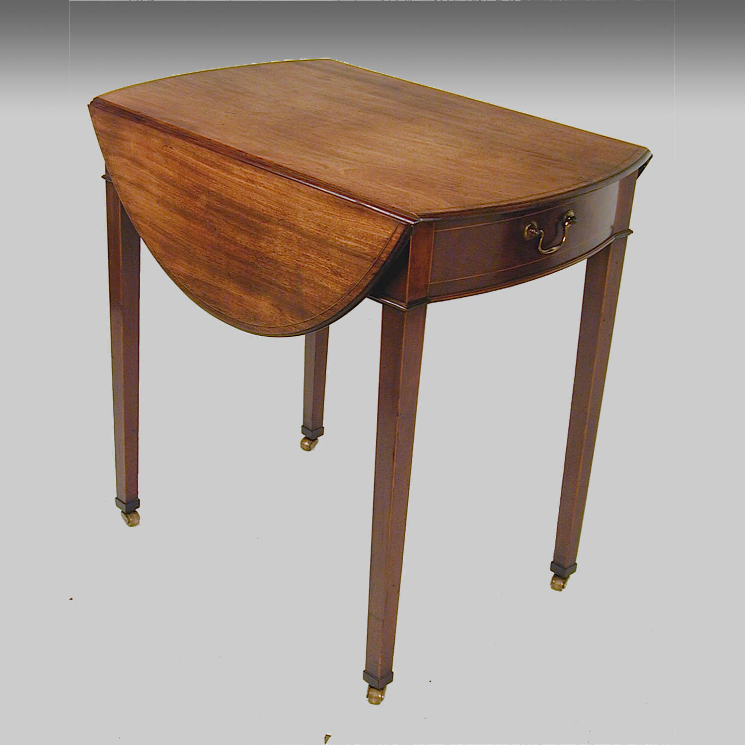 Georgian oval mahogany Pembroke table with secret strongbox drawer