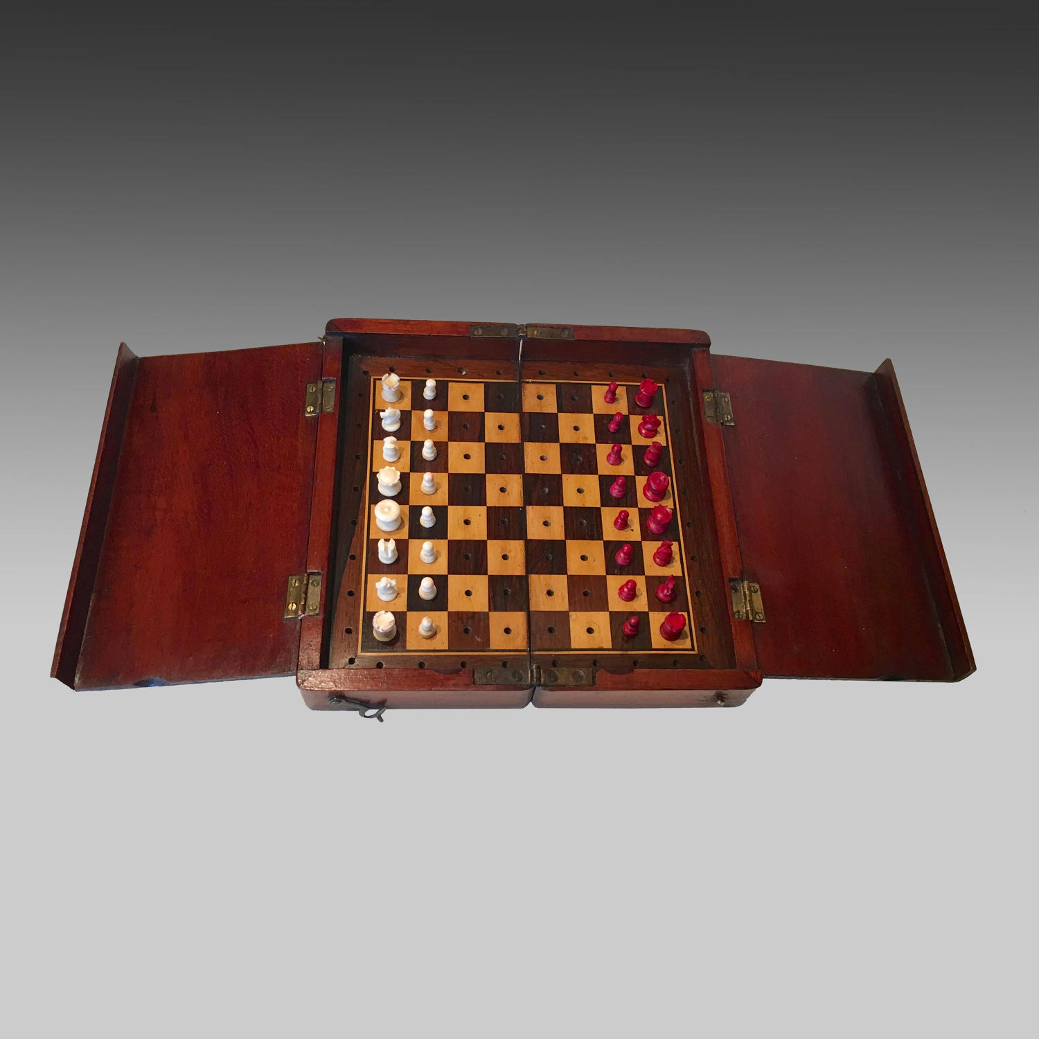 'The Whittington' mahogany cased travelling chess set