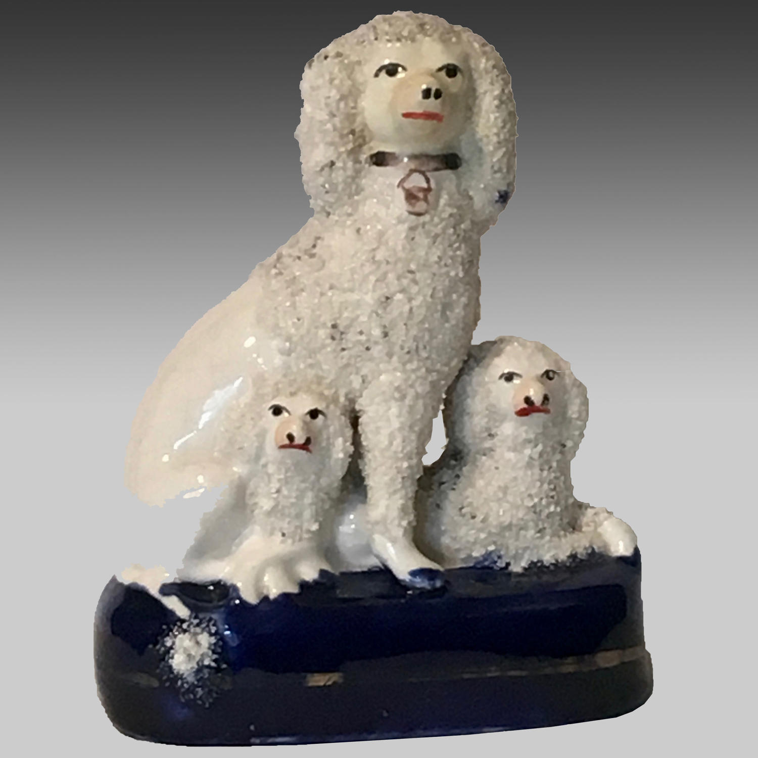 19th century Staffordshire pottery group of poodle & pups