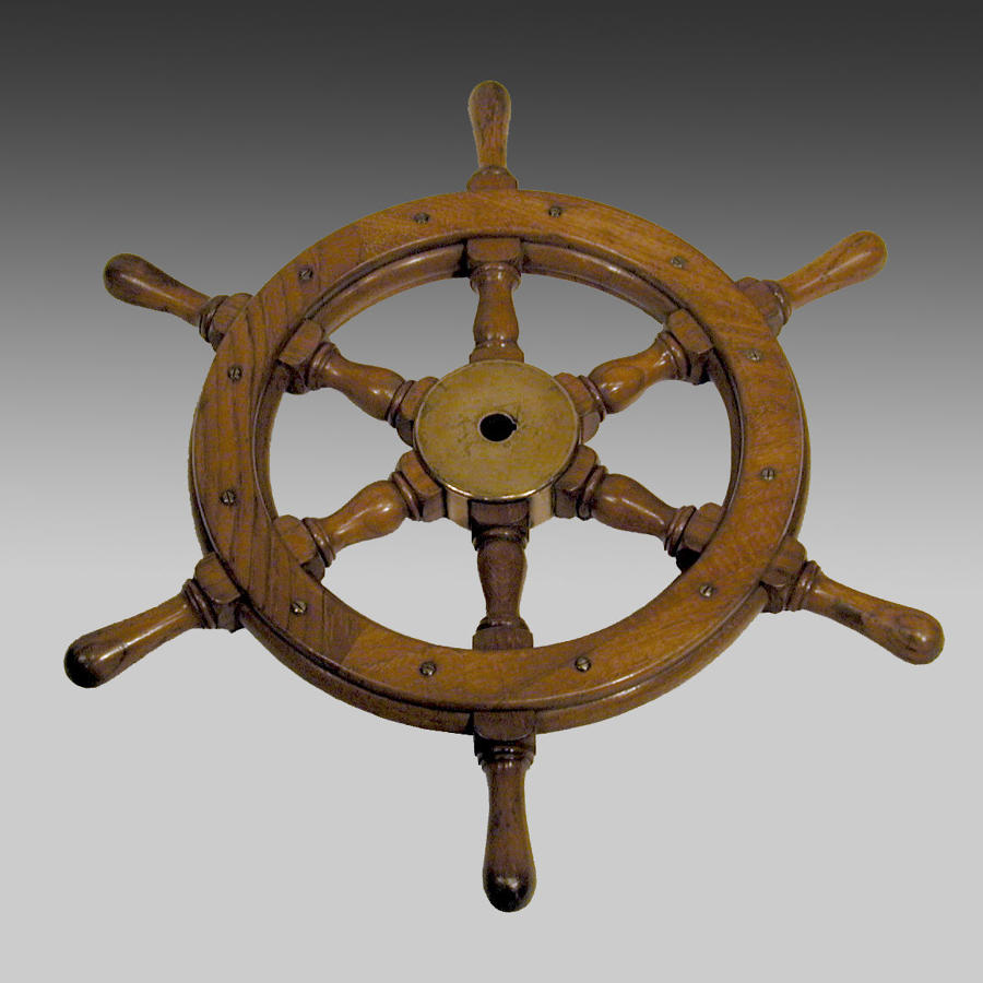 Padouk and bronze mounted ship's wheel.