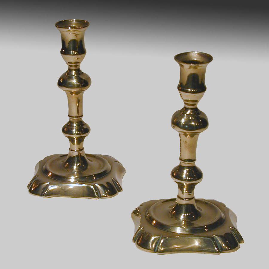 Pair of 18th century seamed brass candlesticks