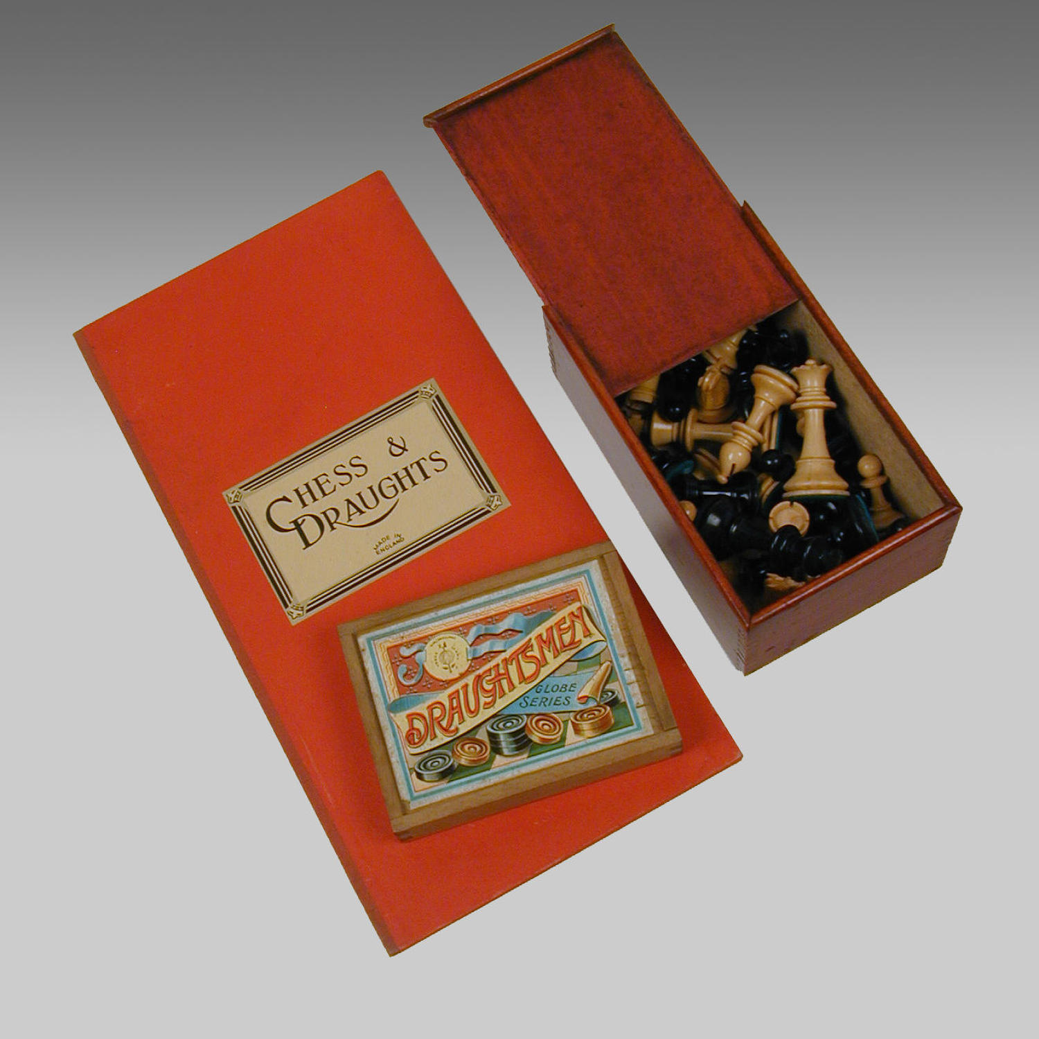 Vintage English boxed Chessmen and Dominoes with folding board