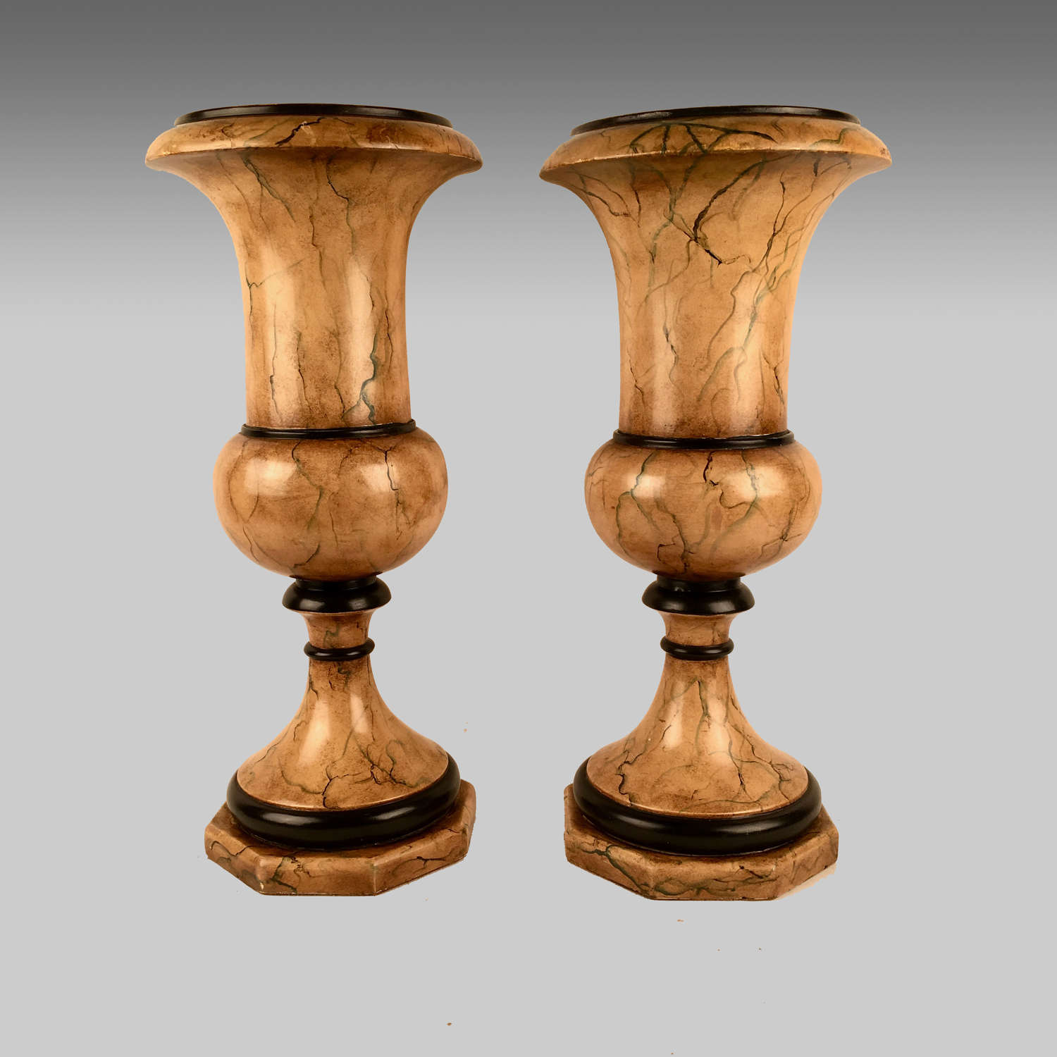 Pair of faux Sienna marble classical urns