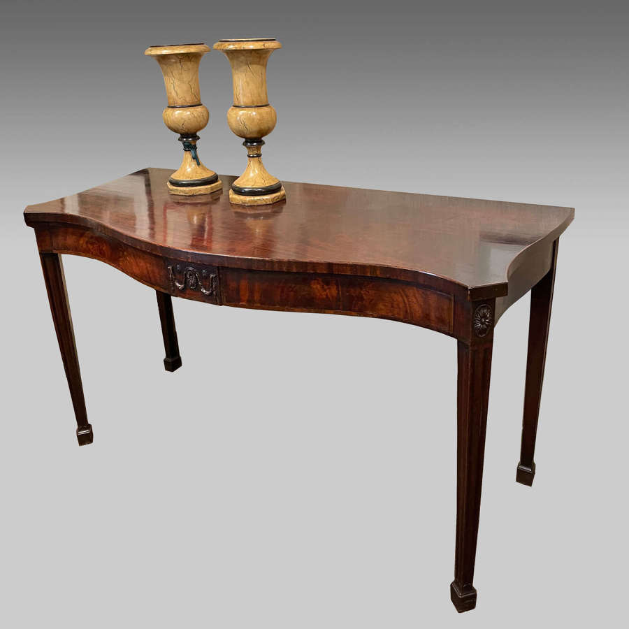 Eighteenth century serpentine mahogany serving table