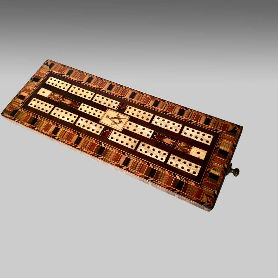 Mid 19th century parquetry inlaid cribbage board.