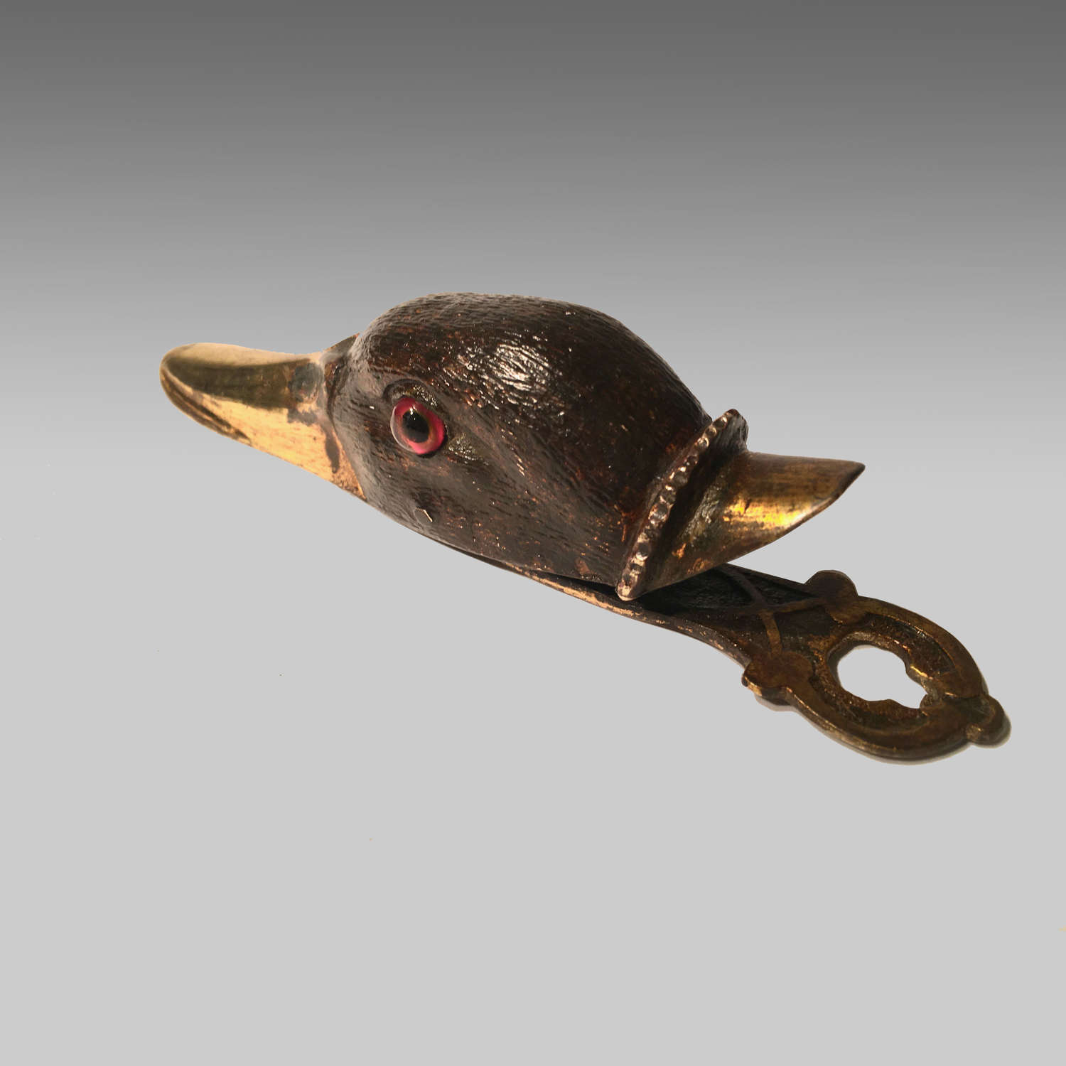 Cast gilt brass paper clip in the form of a duck's head