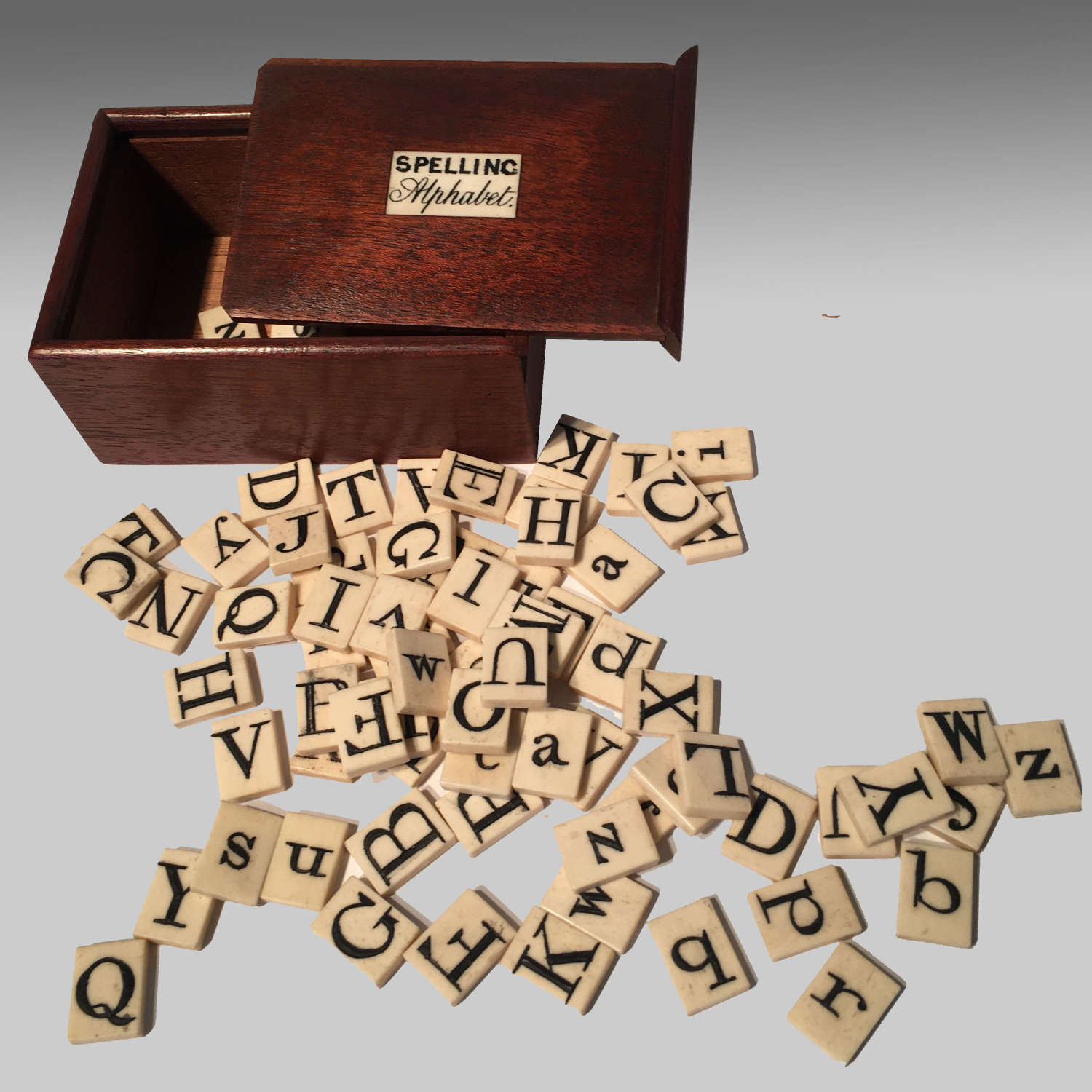 Boxed bone spelling alphabet