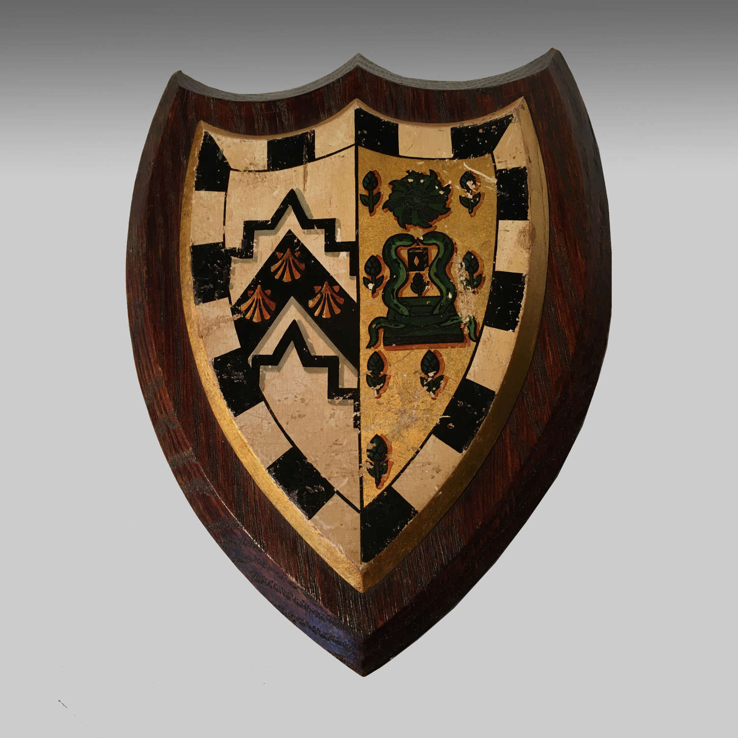 Armorial oak shield - the arms for Gonville & Caius College, Cambridge