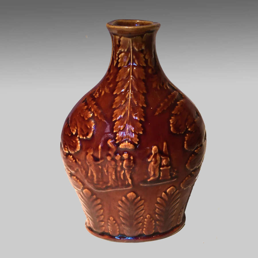 Georgian treacle-glazed pottery gin flask