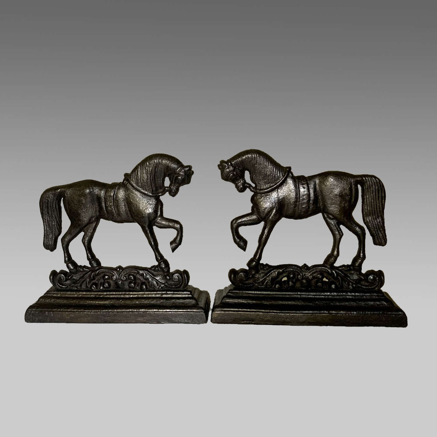 Pair of cast iron horse chimney ornaments