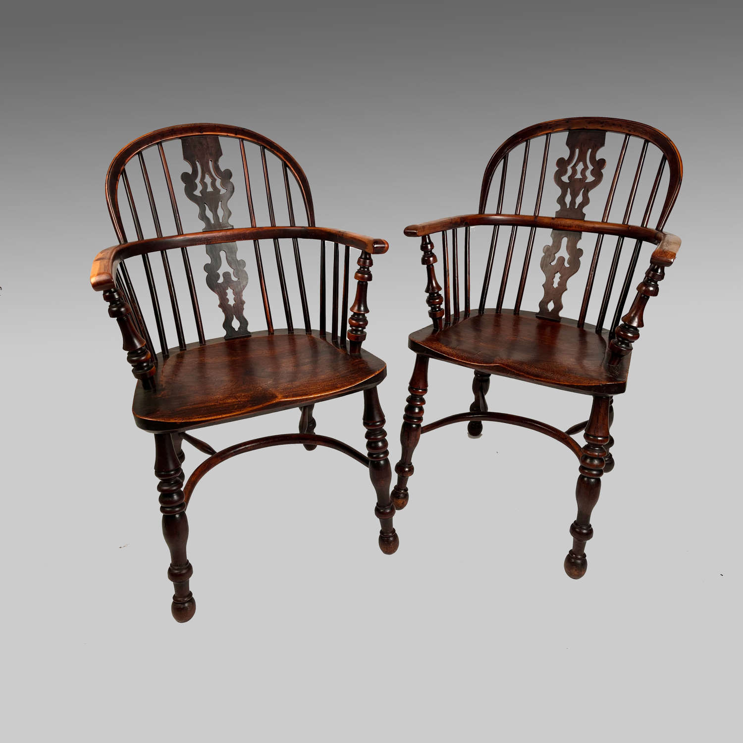 Pair of lowback yew wood Windsor armchairs