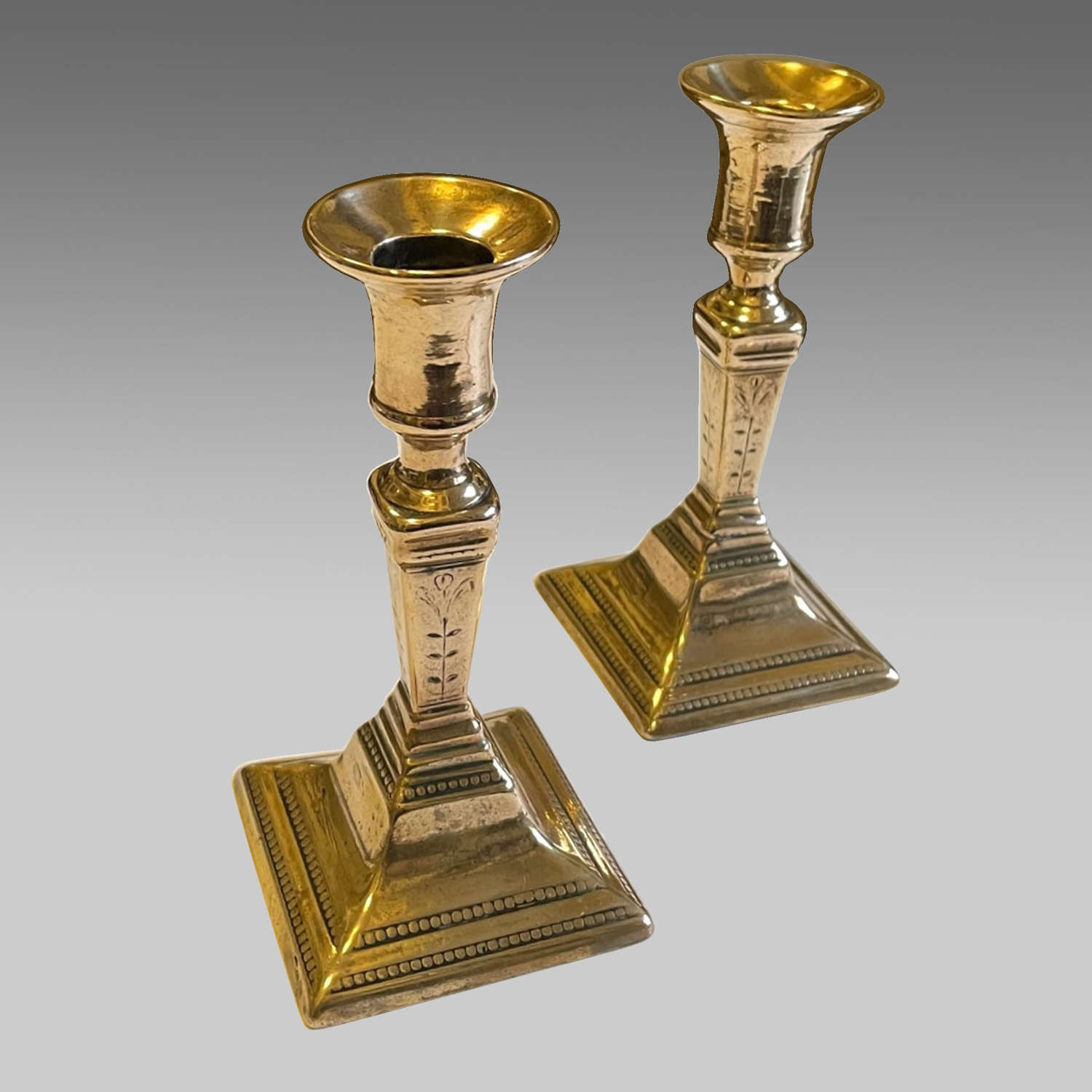 Pair Georgian cast bell metal candlesticks
