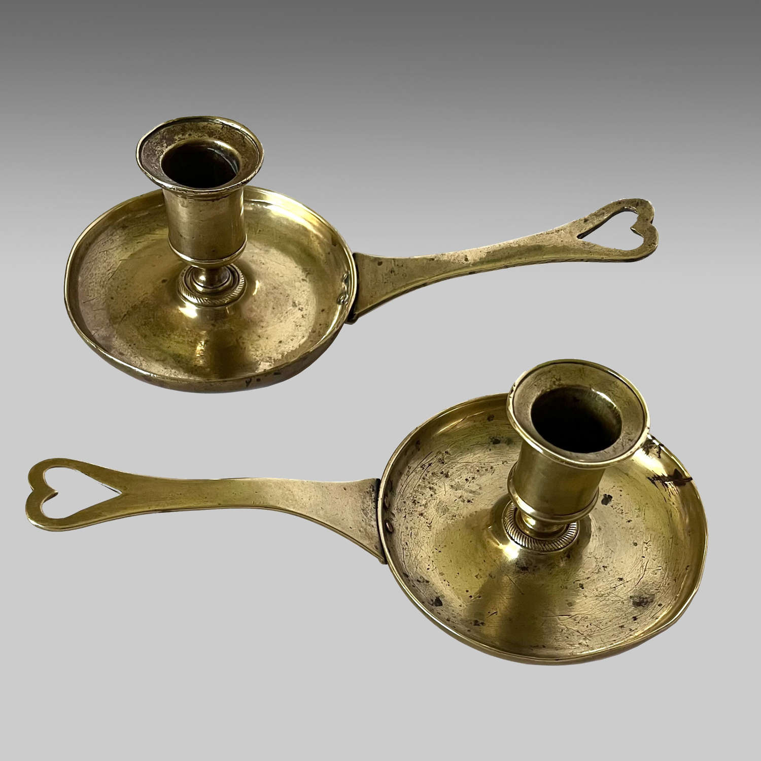 Pair French 18th century cast brass chambersticks