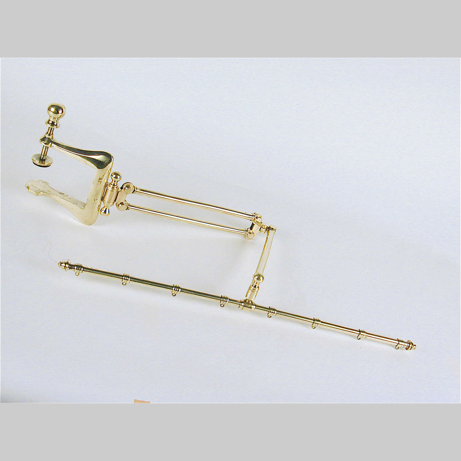 Portable brass tapestry or needlework bracket